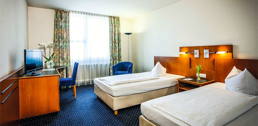 cmyk_hotel-arcadia-landsberg-room-twin-3-eisenberger-2014-lo-1-slider